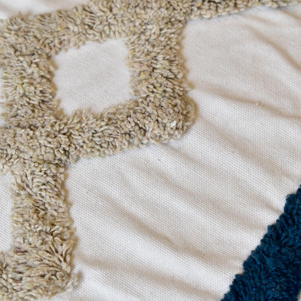 Cojín Rustic 104 multicolor 45×45 cm con diseño geométrico y borlas