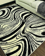 Alfombra moderna en tonos dorado, negro y gris para sala o dormitorio