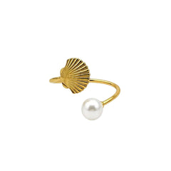 Anillo para servilleta dorado con concha y perla
