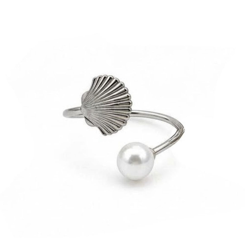 Anillo de mesa con diseño de concha