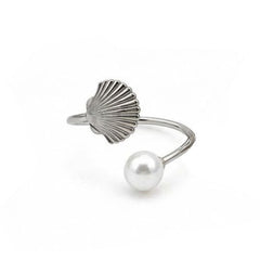 Anillo de mesa con diseño de concha