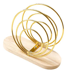 Servilletero espiral dorado con base de bambú de 15 cm