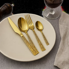 Set de cubiertos Santiago x 24 piezas dorado con detalles ornamentales

