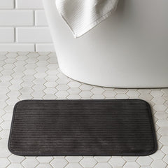 Tapete Baru gris oscuro 40×60 cm, superficie absorbente y base segura.