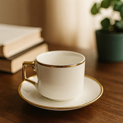 Set de té blanco con bordes dorados taza y plato