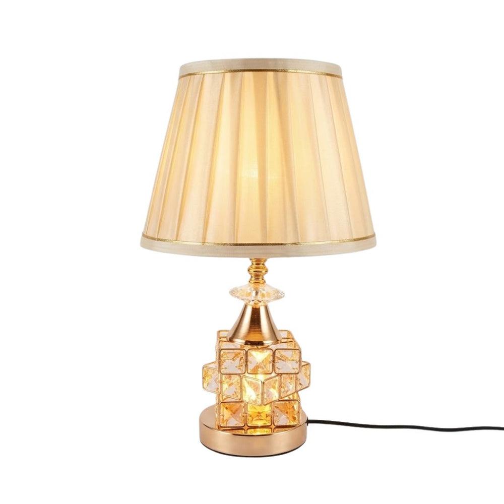 Lámpara decorativa de mesa con cuerpo geométrico de cristal