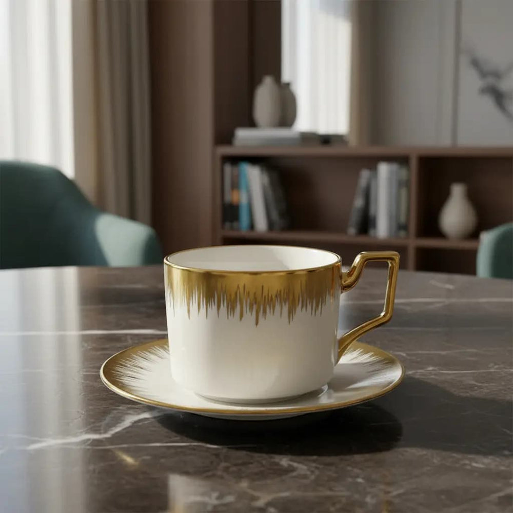 Set plato con pocillo blanco con dorado diseño sol y asa geométrica dorada