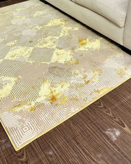 Alfombra rectangular gris con diseño geométrico y detalles dorados 1.20 × 2.17 m