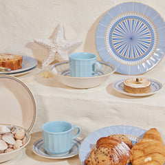 Set de vajilla 4 puestos Azura Corona con platos y pocillos