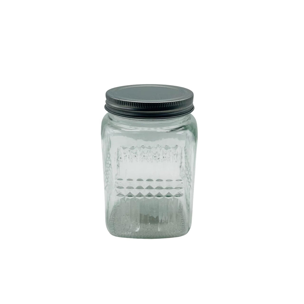 Recipiente de cristal cuadrado con líneas texturizadas y tapa plateada